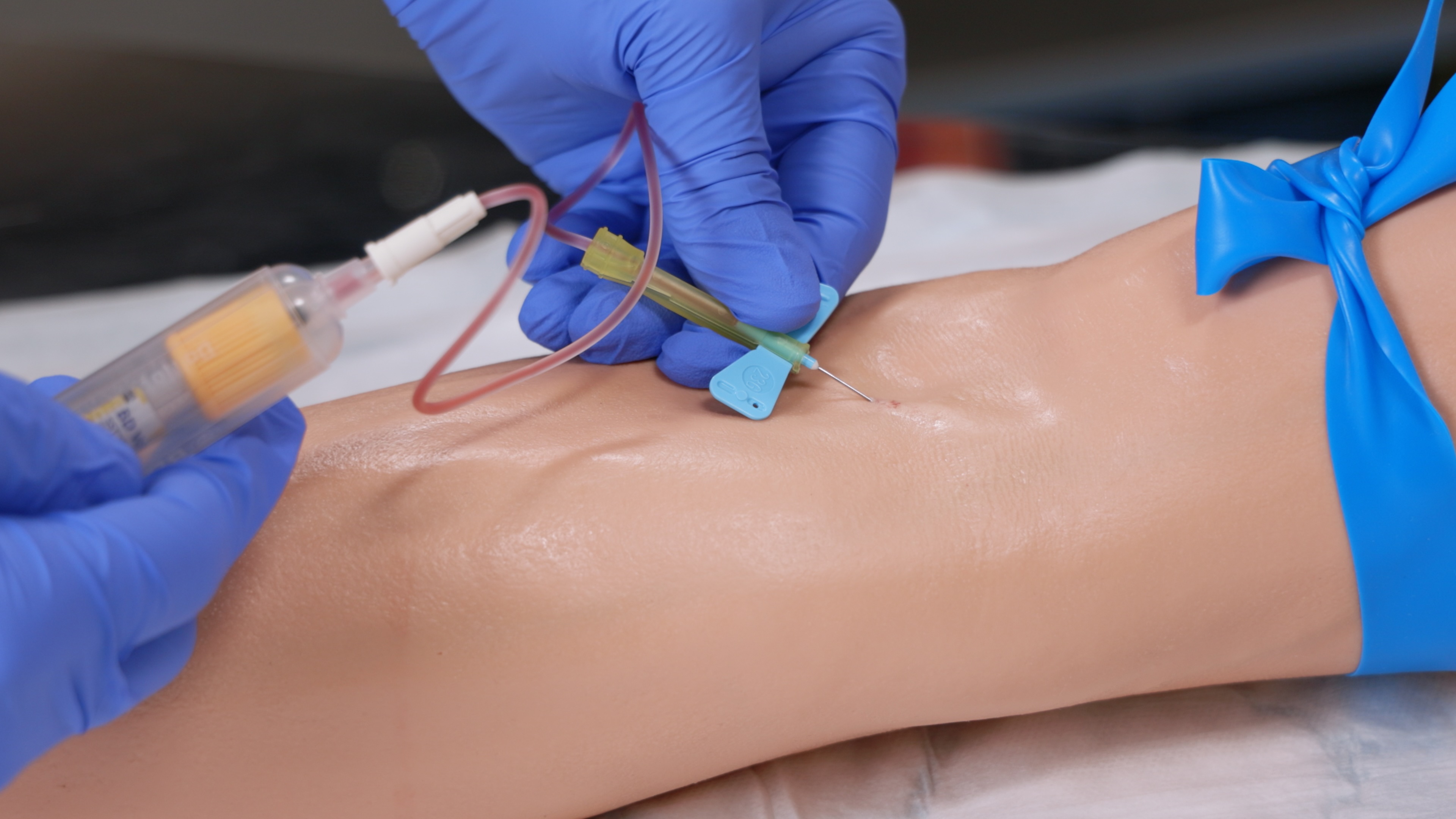 A part task training device is used to practice the skills of Phlebotomy A part task training device is used to practice the skills of Phlebotomy